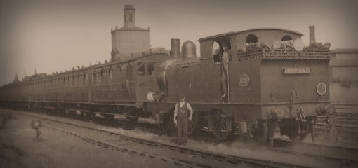 No.1099, mentioned in the text above, is seen with a train of four-wheeled carriages at Romford Factory, the original Eastern Counties Railway Loco Works.The date is before its first rebuilding with a 160psi boiler in 1906. It might have been frowned upon as bad practice, but here's proof that putting discs on both ends of the loco at the same time actually happened. The discs indicate the service indicate the service runs between Liverpool Street and Romford, Brentwood, Shenfield or Chelmsford, running on the Through line into and out of Liverpool Street.  Up Chelmsford, Shenfield ot Chelmsford trains funning on the Through line from any point betweenRomford Junct. and Bow Junct. inclusive were required to carry no Distinguishing Dics by day and a white light only under the chimney at night. Engines running on the Local line between Bethnal Green and Liverpool Street were to carry white-edged green discs or green lights over the buffers only between those two points. Photograph ©Public Domain